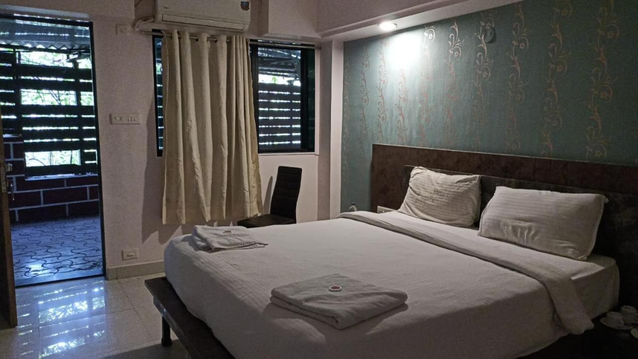 Hotel Laxmi Residency Лонавала Экстерьер фото